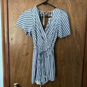 white and blue striped open back romper size small